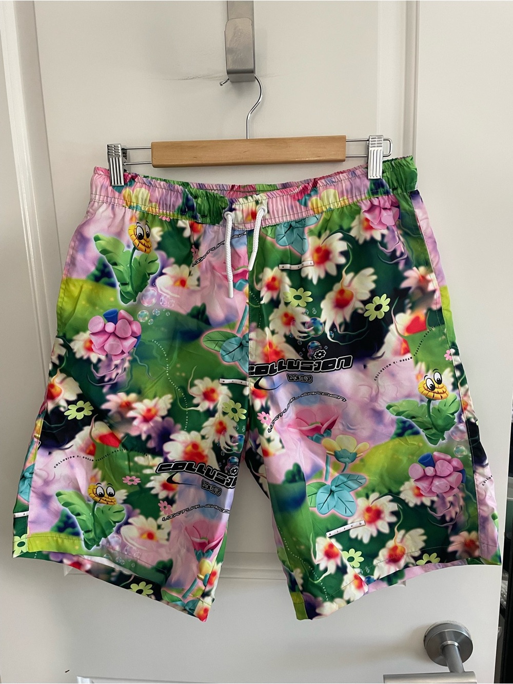 Collusion Unisex Floral Graphic Swim Shorts in Green & Pink